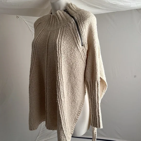 Free People Spin Around Poncho Top in an off-white cream color - Picture 4 of 10